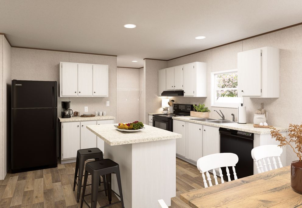 Bright modern kitchen with white cabinets, black fridge, island stools, and a wooden dining table