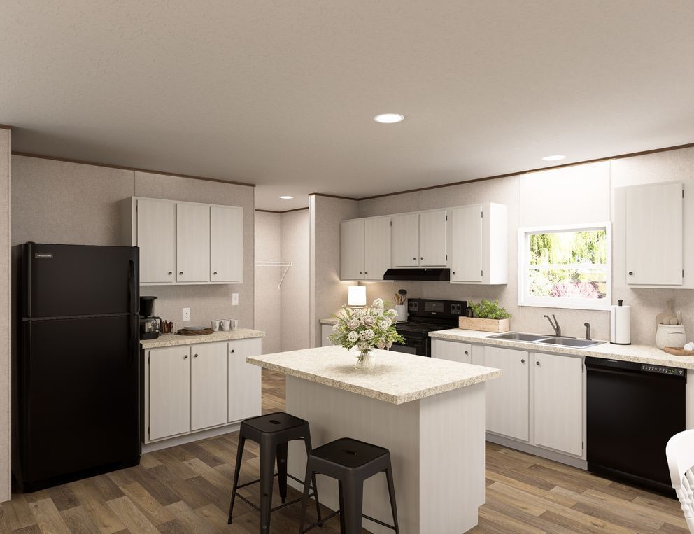 Bright modern kitchen with white cabinets, black appliances, island, and two black stools.