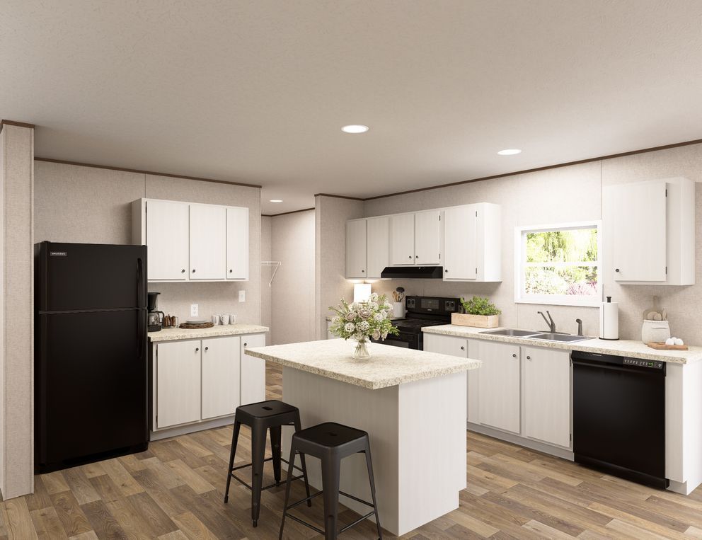 Bright modern kitchen with white cabinets, black appliances, and a center island with stools