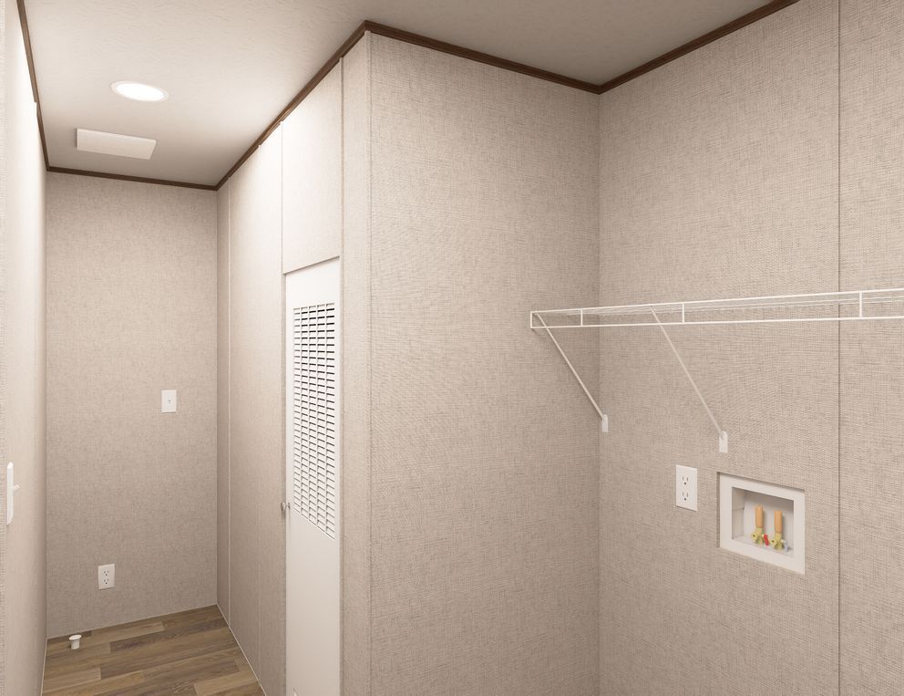 Empty beige hallway with wood floor, ceiling light, closet door, and wall-mounted shelf brackets