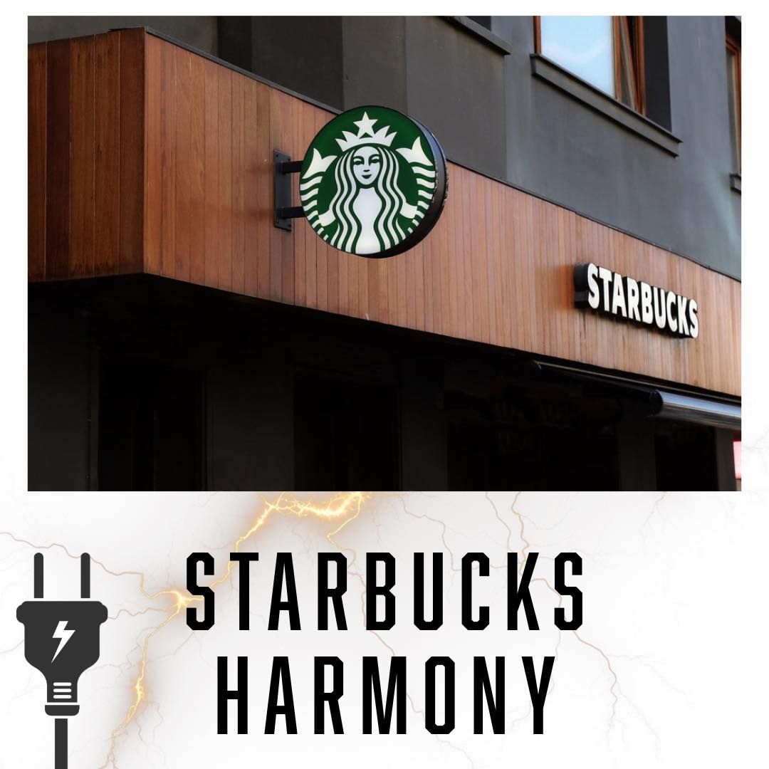 Starbucks storefront with green logo, wooden paneling, and Starbucks Harmony graphic with a plug.