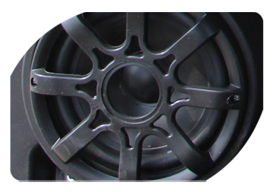 A close up of a speaker that looks like a wheel