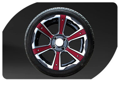 A car wheel with red and white stripes on it