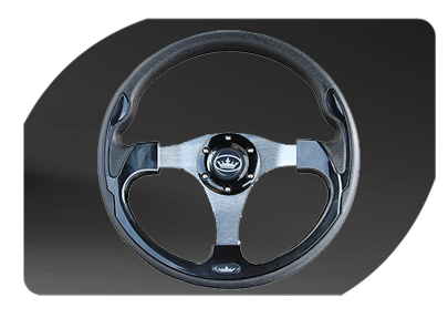 A black and silver steering wheel with a crown on it