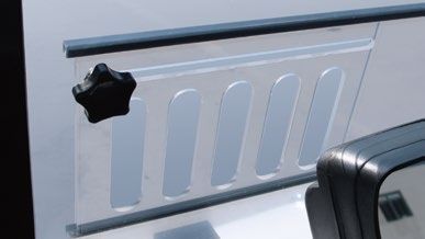 A close up of a rear view mirror on a car.
