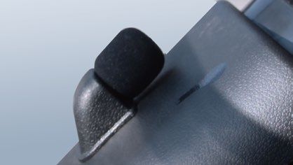 A close up of a black object with a rubber pad on it.
