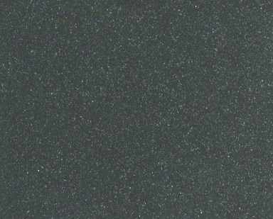 Dark gray speckled texture with fine white noise-like dots across the surface
