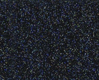 Dense field of tiny blue, white, and yellow specks on a black background, like digital static