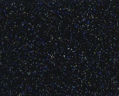 Dark starry sky filled with countless small white and blue stars