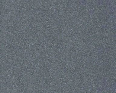 Close-up of a gray, speckled textured surface