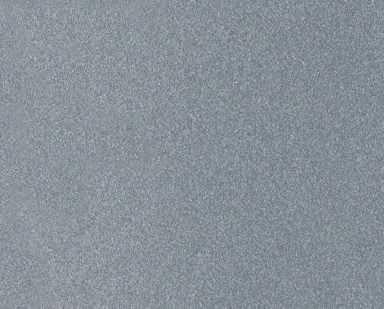 Blank gray textured surface with fine speckled pattern