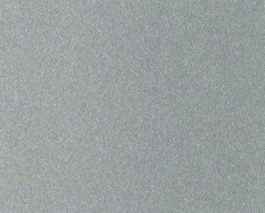 Close-up of a gray, speckled textured surface