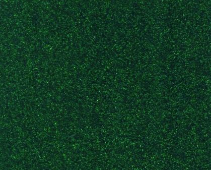 Dark green textured background with a speckled, grainy pattern