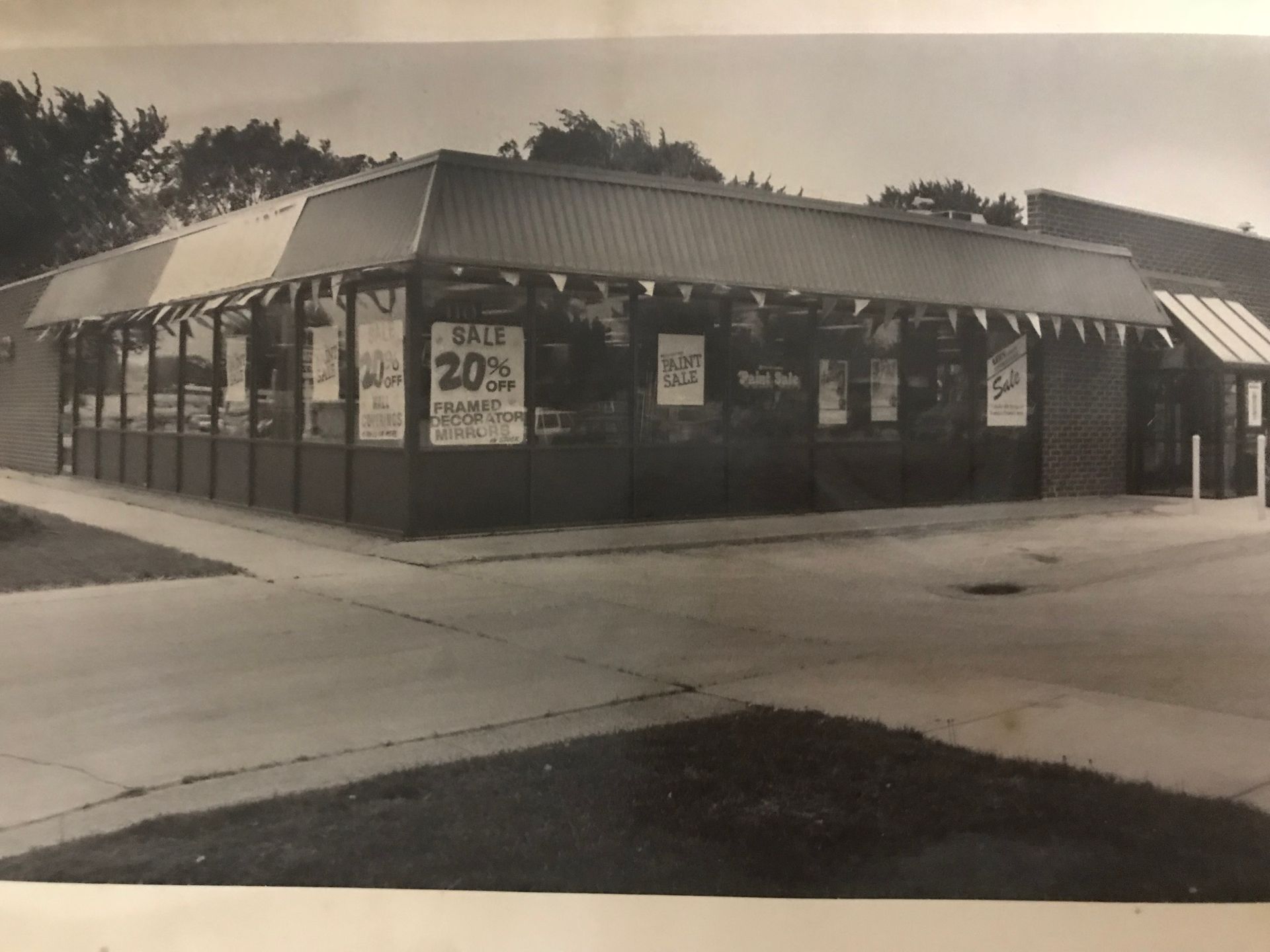 storefront with sale posters