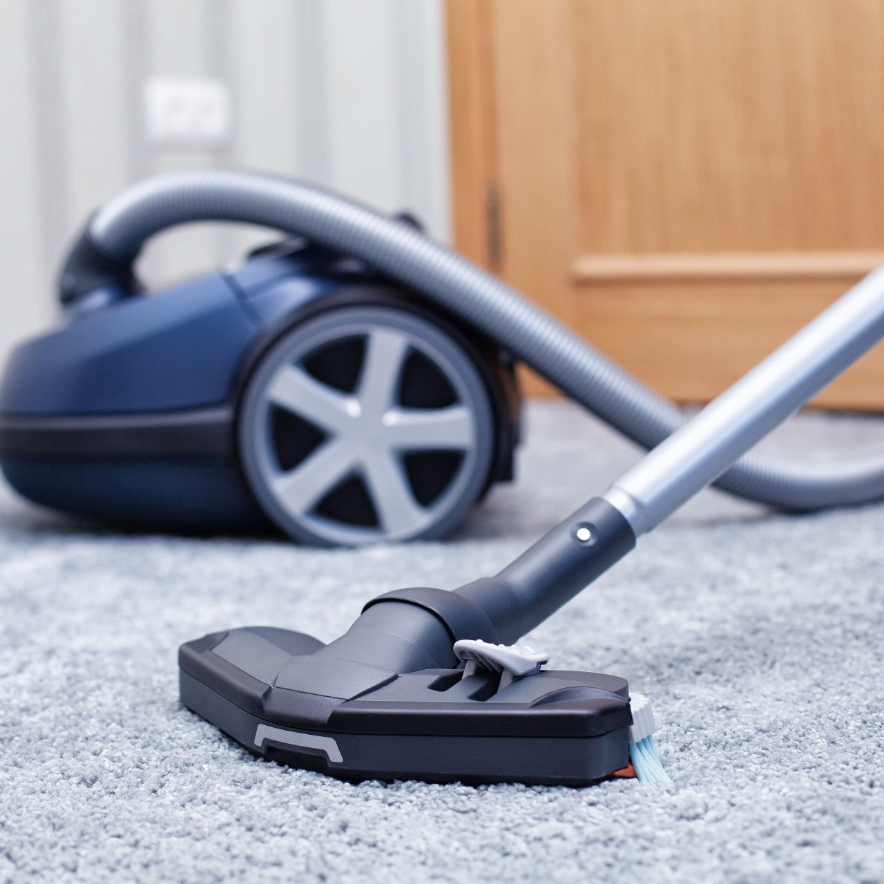 Vacuuming carpet