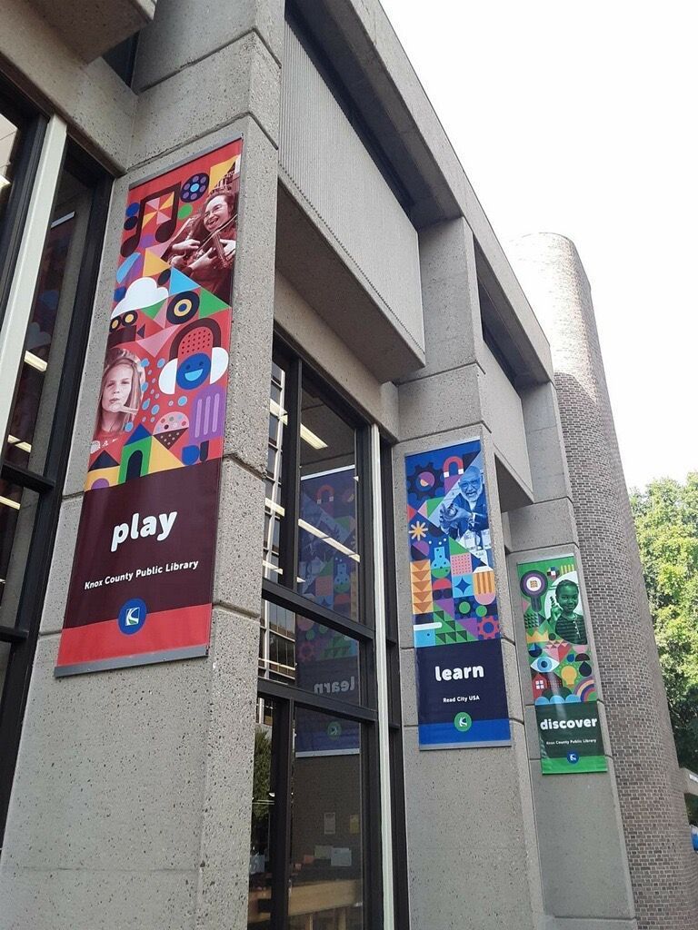 Library exterior with banners reading