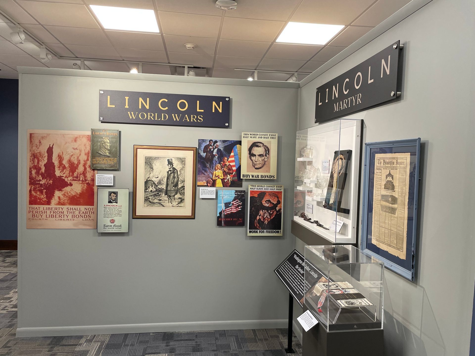 Museum exhibit with Lincoln memorabilia on display.
