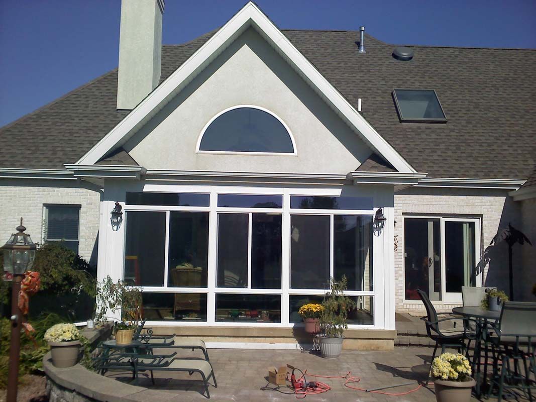 A large white house with a lot of windows