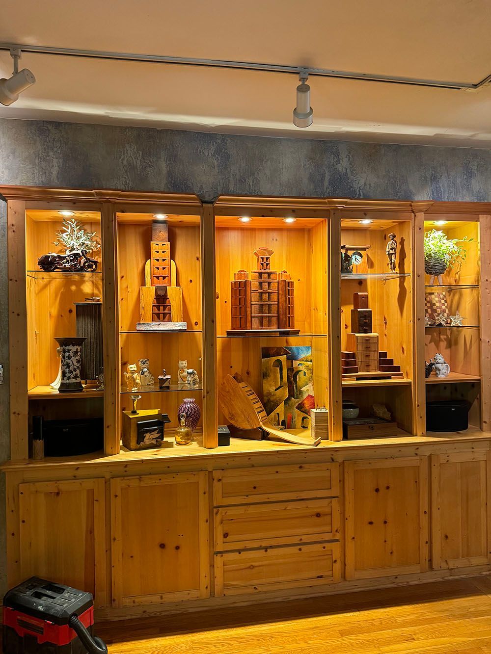 A display case with a lot of items in it