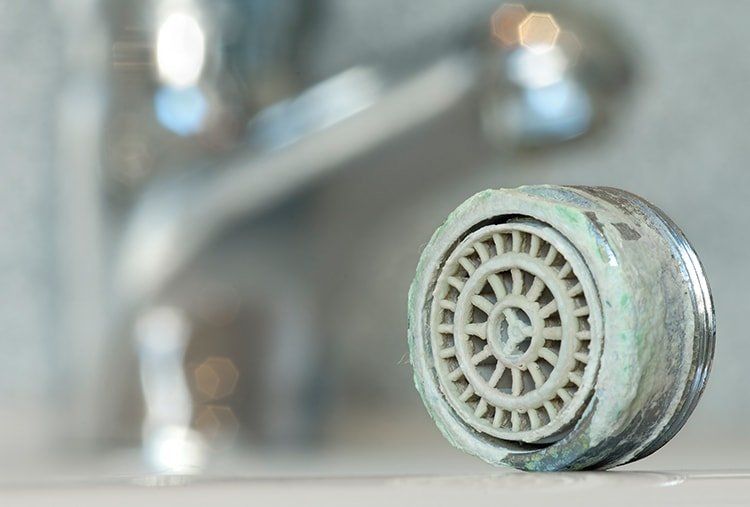 How to Get the Gunk Out of Your Faucet