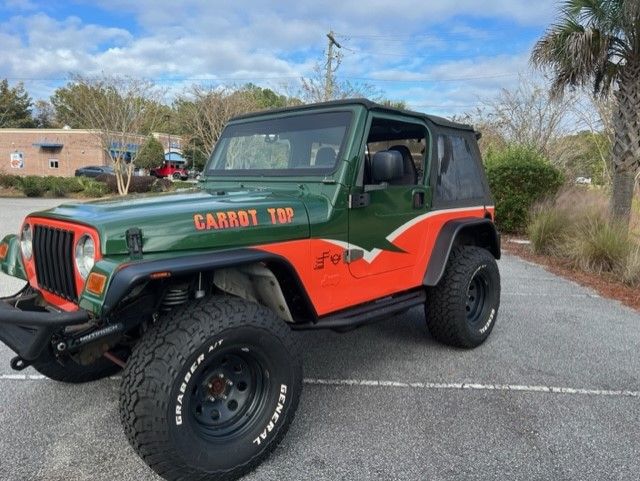 Green and orange Jeep Wrangler, 