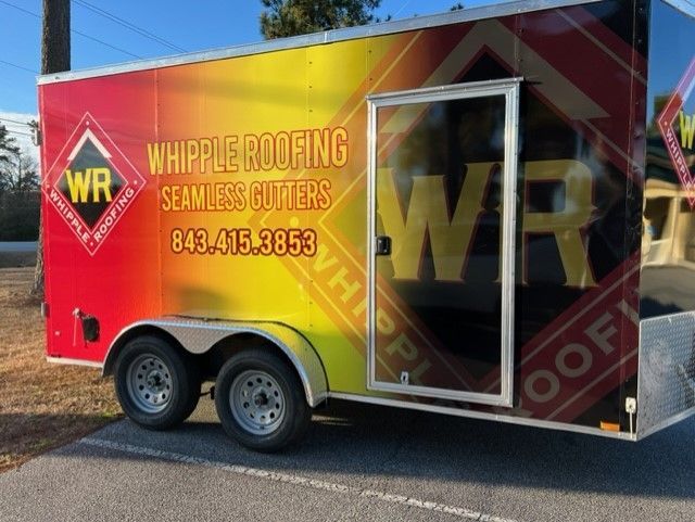 Whipple Roofing trailer with logo, red/yellow gradient, door. Phone number: 843.415.3853.