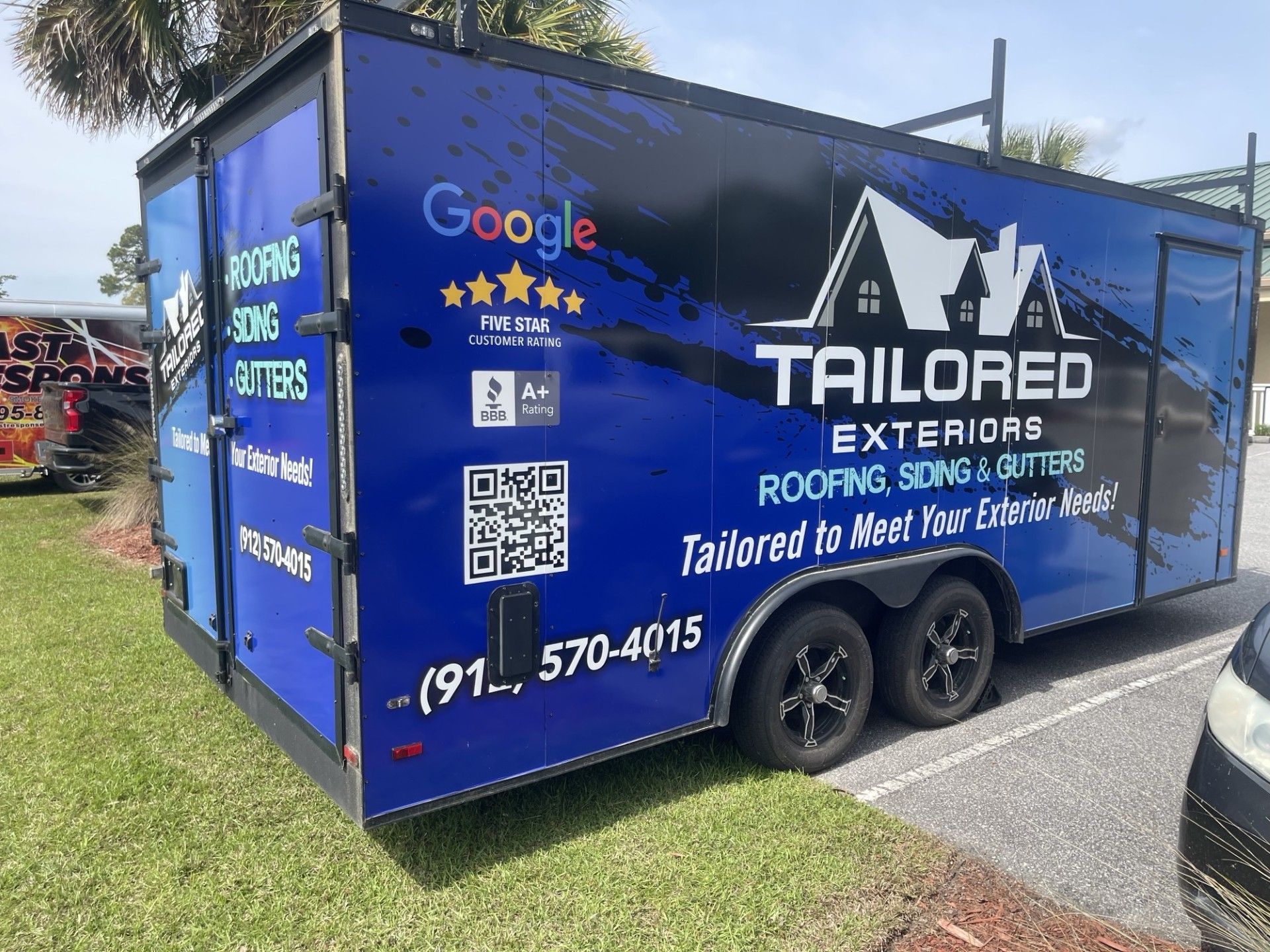 Blue and black trailer for 