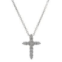 Silver necklace with diamond-studded cross pendant.