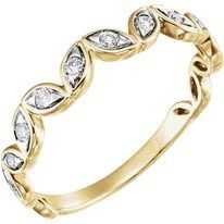 Gold ring with alternating marquise-shaped diamond settings.