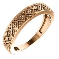 Rose gold ring with a geometric pattern.