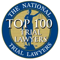 The National Top 100 Trial Lawyers emblem: Lady Justice silhouette in a blue and gold seal.