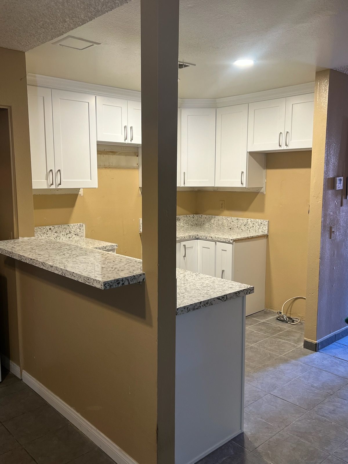 kitchen with marble counter top