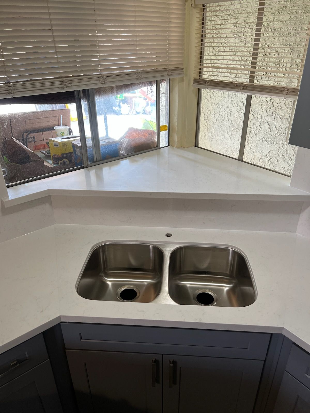 kitchen sink on a white countertop