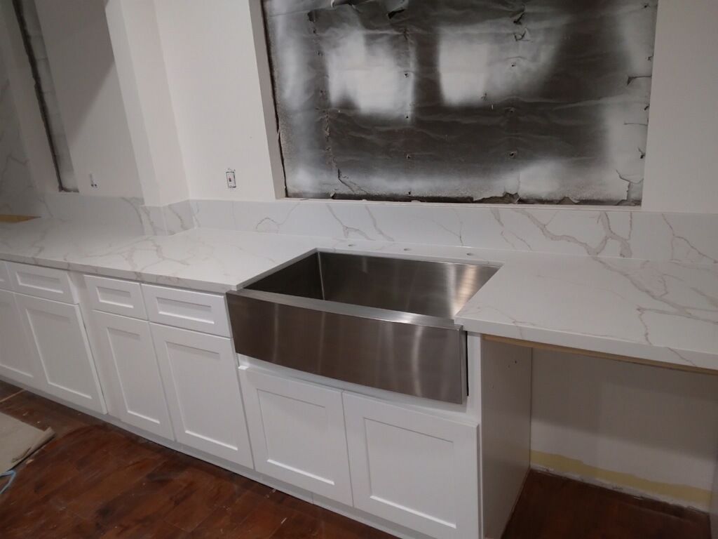 kitchen sink on a white countertop