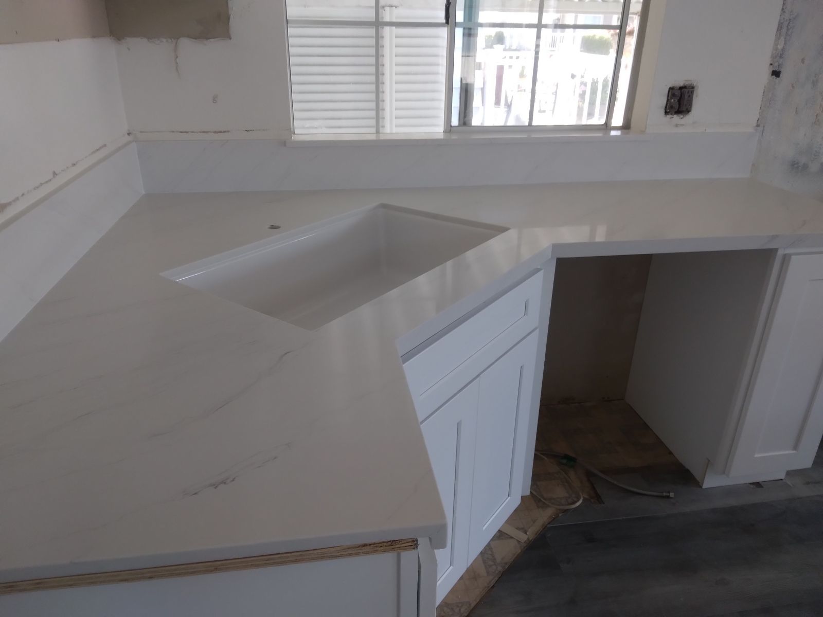 kitchen sink with a white countertop