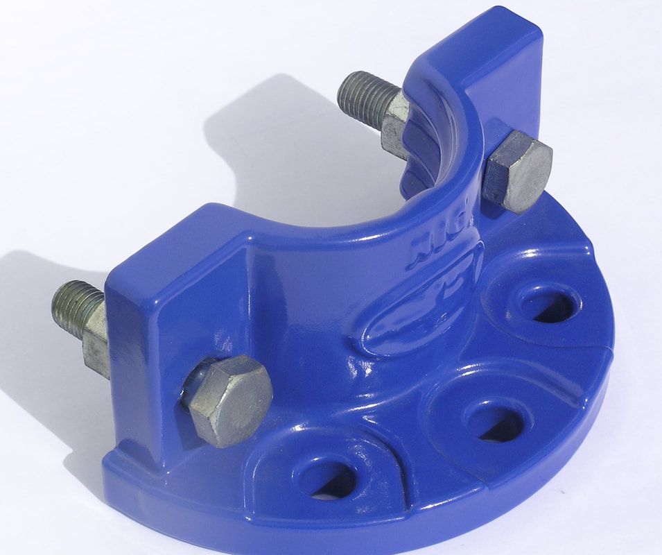A blue pipe flange with nuts and bolts on it