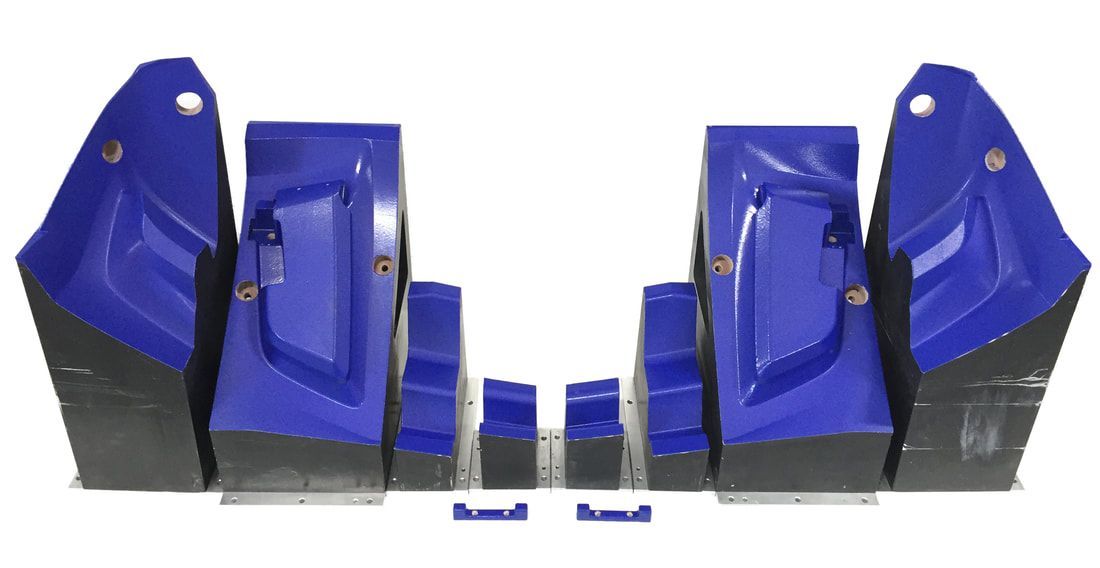 A set of blue plastic molds on a white background