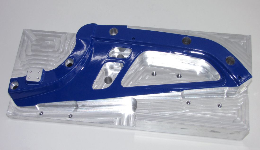 A blue object is sitting on top of a clear object