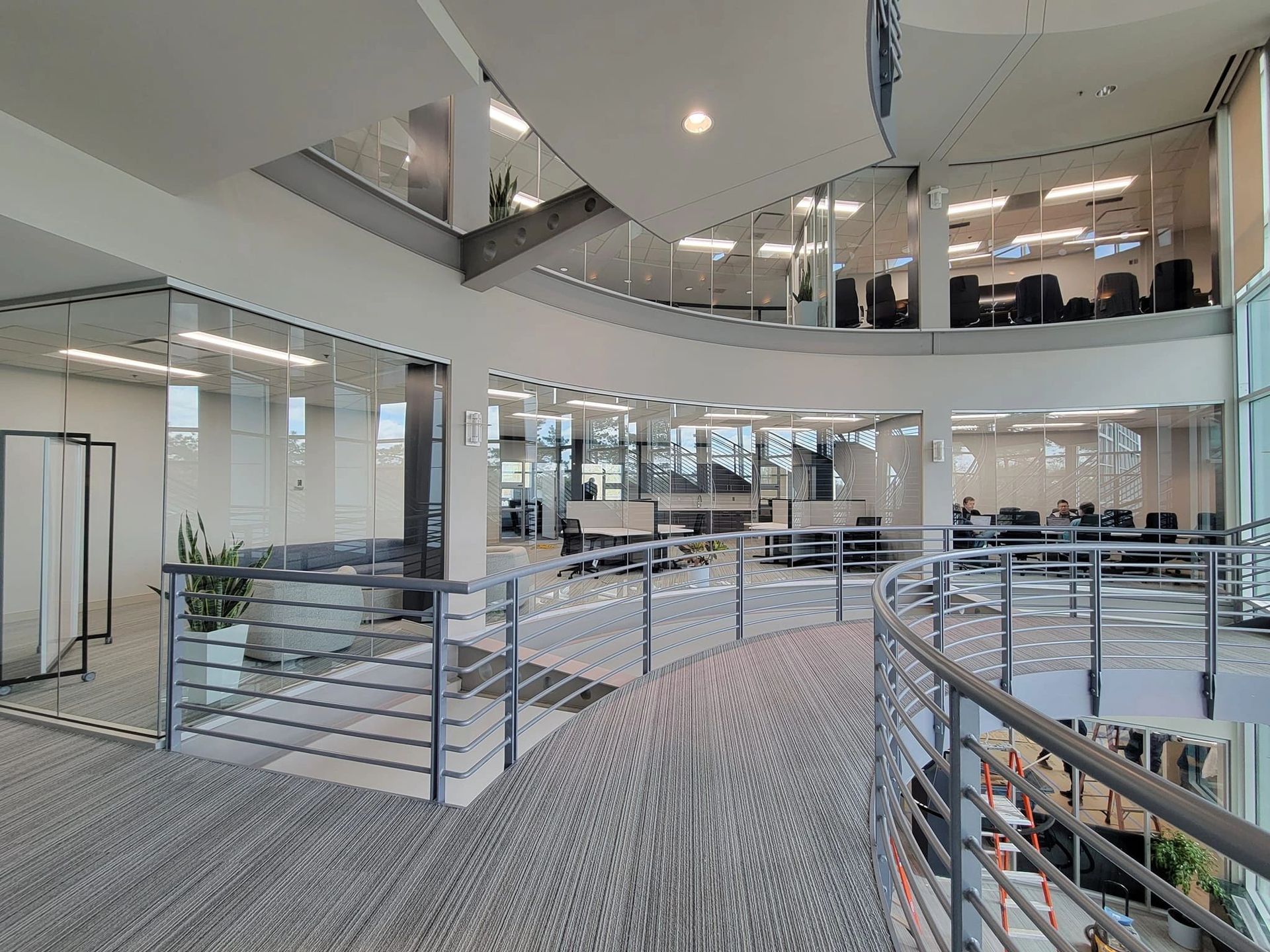 A large building with a lot of windows and a balcony.