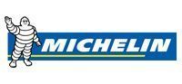 The Michelin Man mascot with the company's blue rectangle logo with the name 
