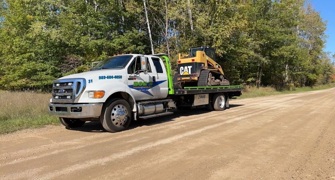 Equipment towing service