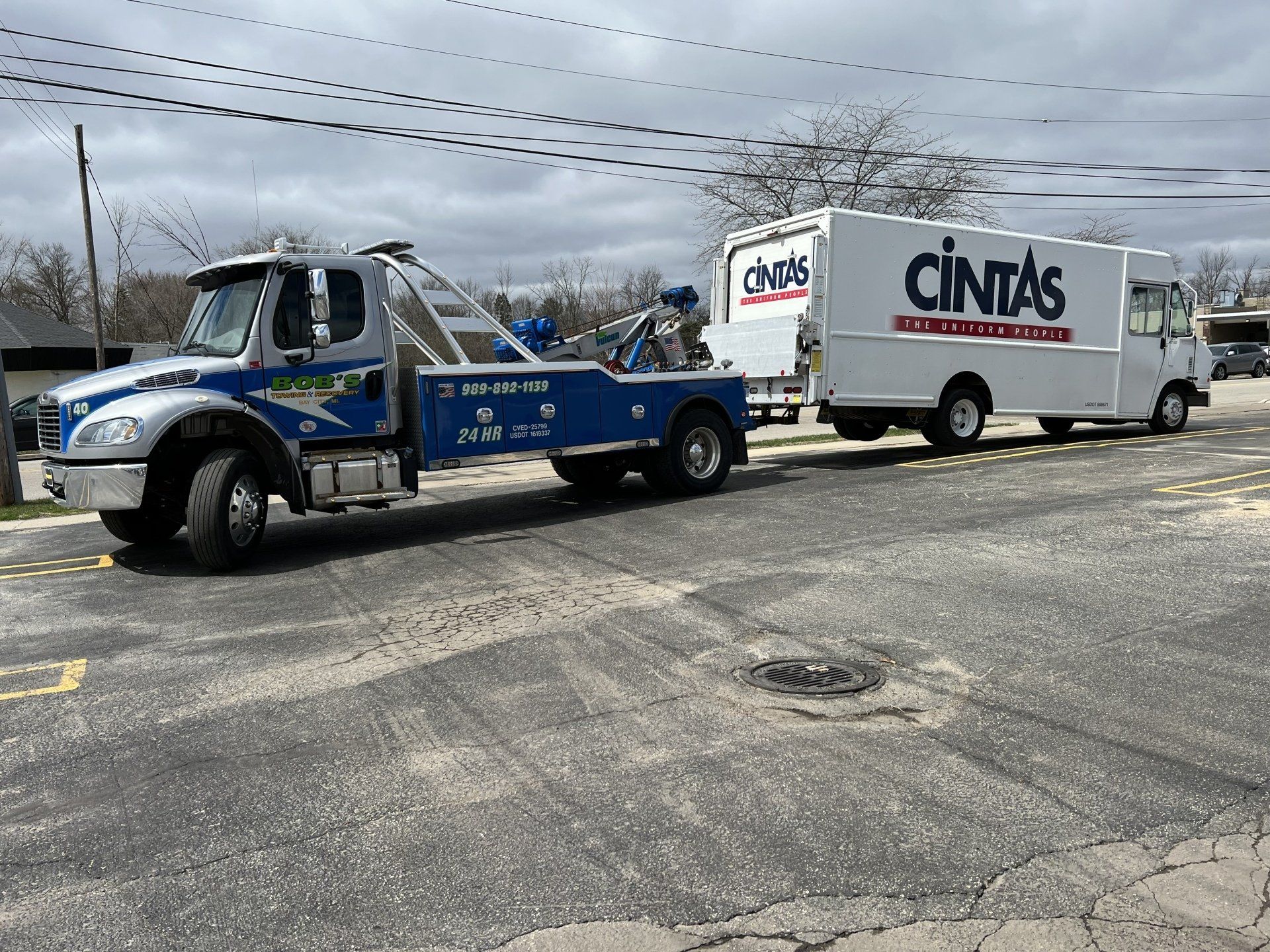 Cintas truck being towed