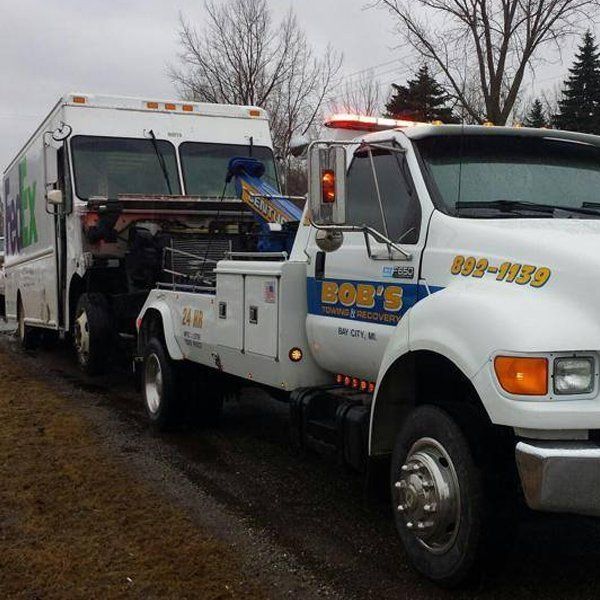 FedEx truck towing