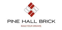 Pine Hall Brick logo with red and gray bricks above the slogan “Build Your Dreams.”