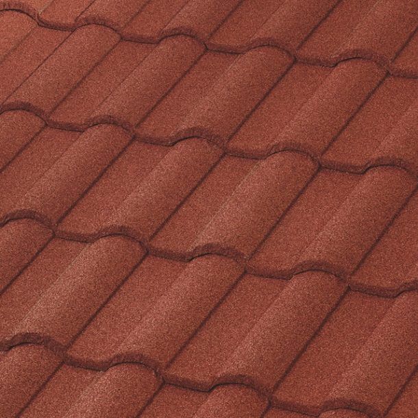 Close-up of red, textured roof tiles arranged in rows.