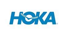 HOKA logo in blue, featuring the brand name and a flying bird icon.