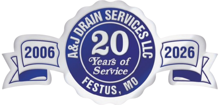 A&J Drain Services LLC logo: Blue and white emblem celebrating 20 years of service, with dates 2006 and 2026, Festus, MO.