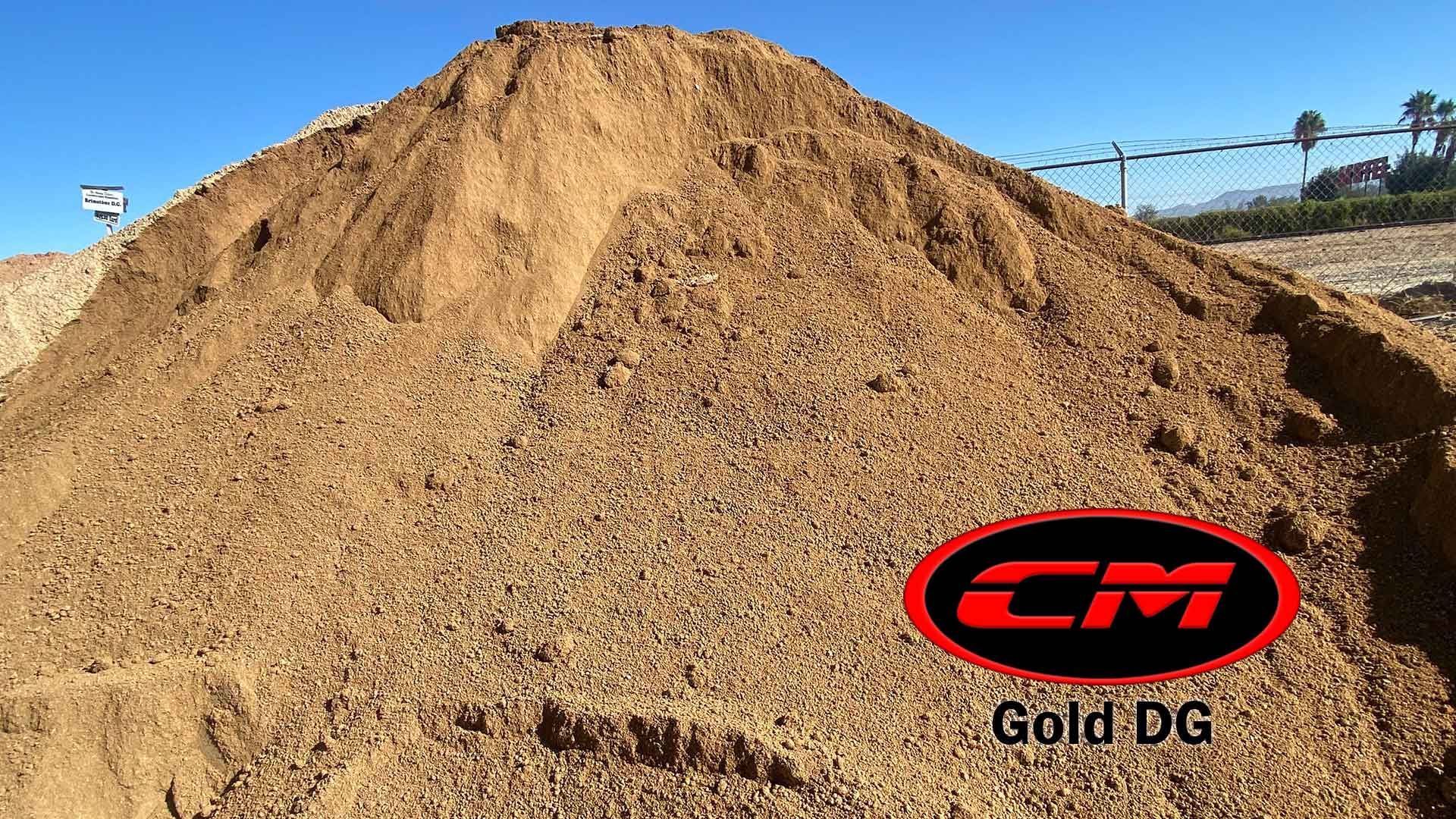 Pile of tan-colored dirt, likely topsoil, with the 