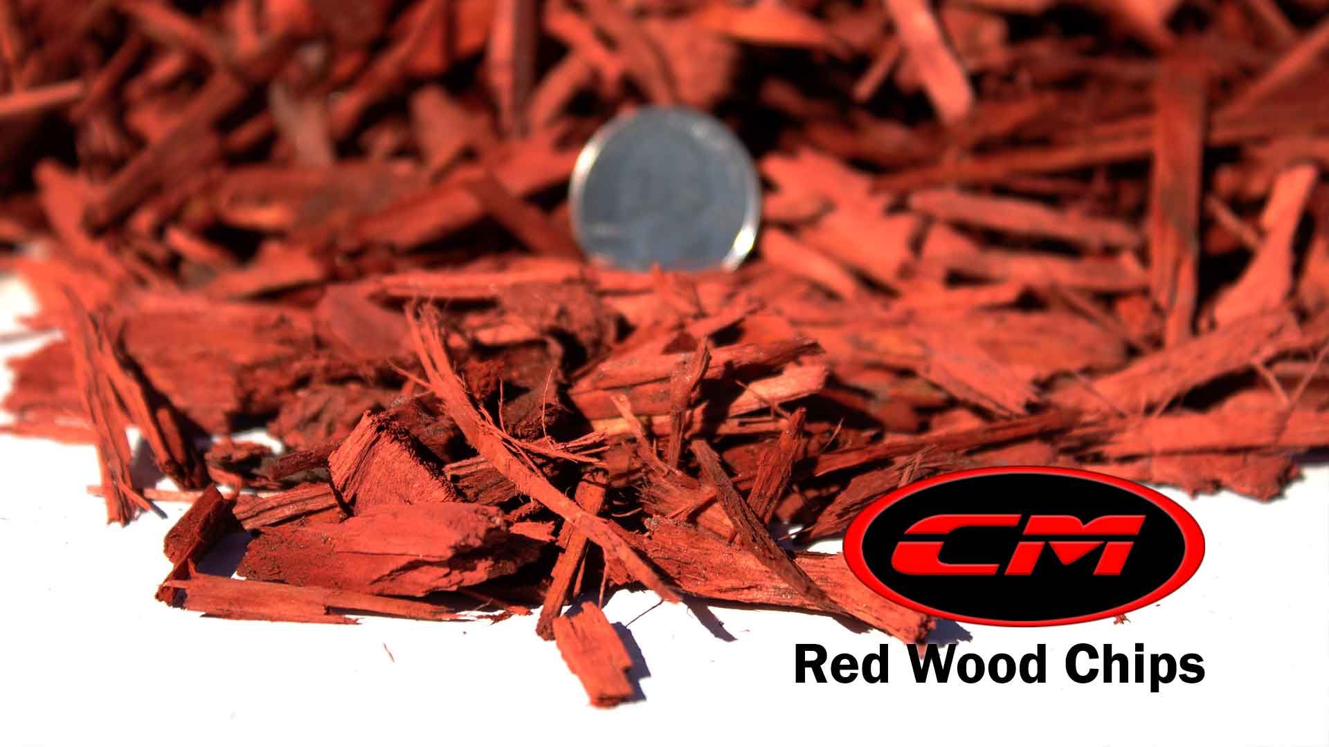 Red wood chips with a quarter, CM logo.