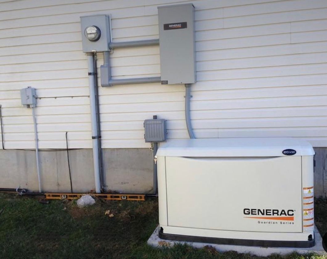 A generac generator is sitting on the side of a house